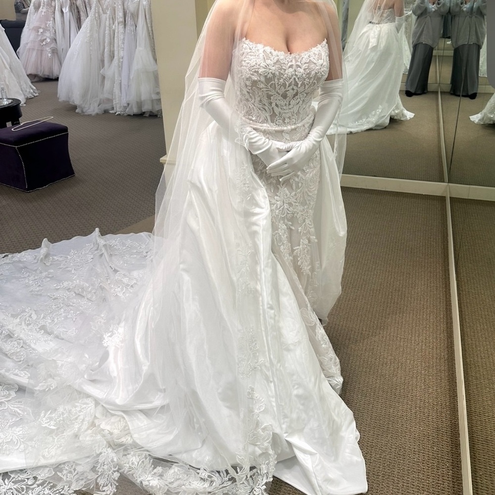 Elegant White Wedding Gown with Lace Details